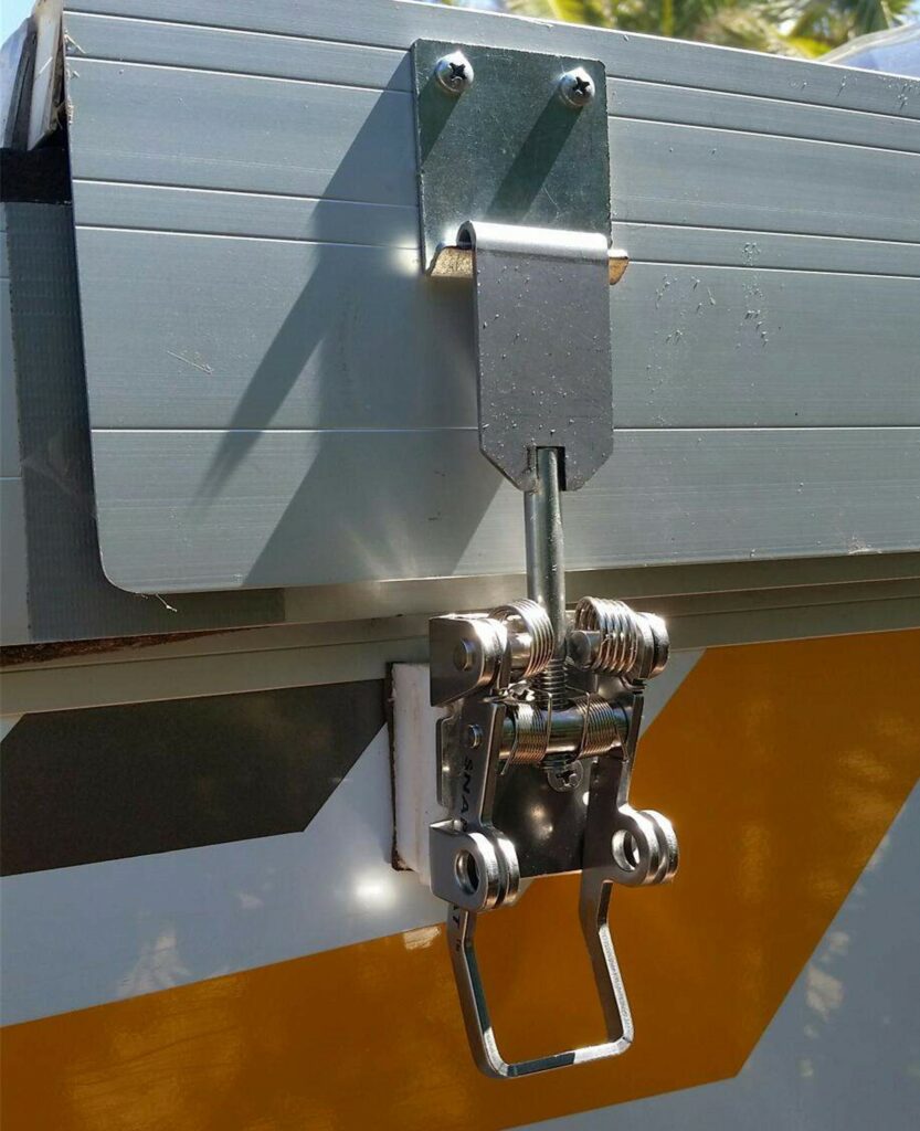 Photo showing Snap-Flat Caravan style roof clamp retro-fitted to a Pop Top